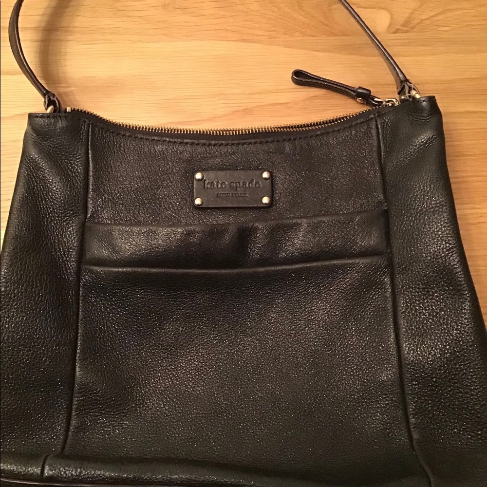Black with green interior Kate Spade bag